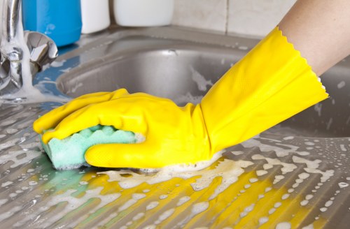 Local oven cleaner working in a Catford kitchen